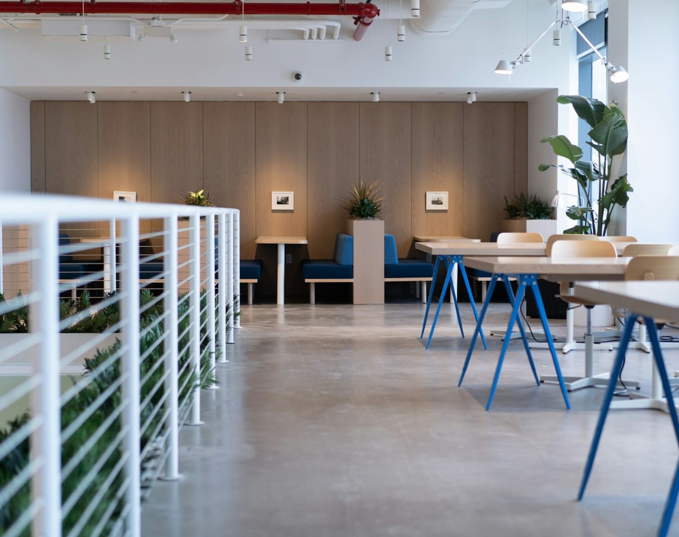 white-and-blue tables facing white balustrade